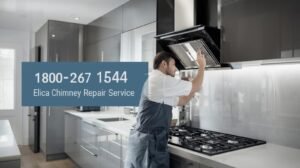 Technician repairing an Elica kitchen chimney with toll-free support 1800 267 1544